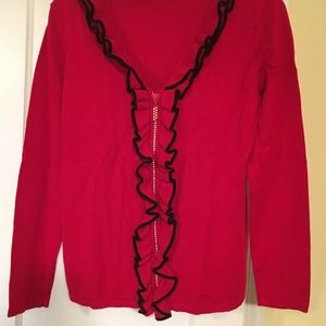 Woman’s  red and black sweater